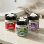 Degleri hand and body cream full collection — rose, jasmine and lavender varieties displayed in a Mediterranean bathroom niche
