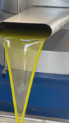 Degleri Premium Extra Virgin Olive Oil being pressed from same-day harvested olives from the Degleri family-owned groves, low in acidity and rich in polyphenols